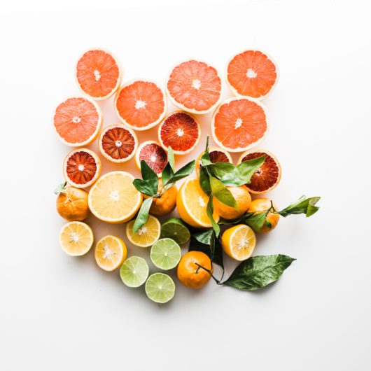 sliced fruit on white surface